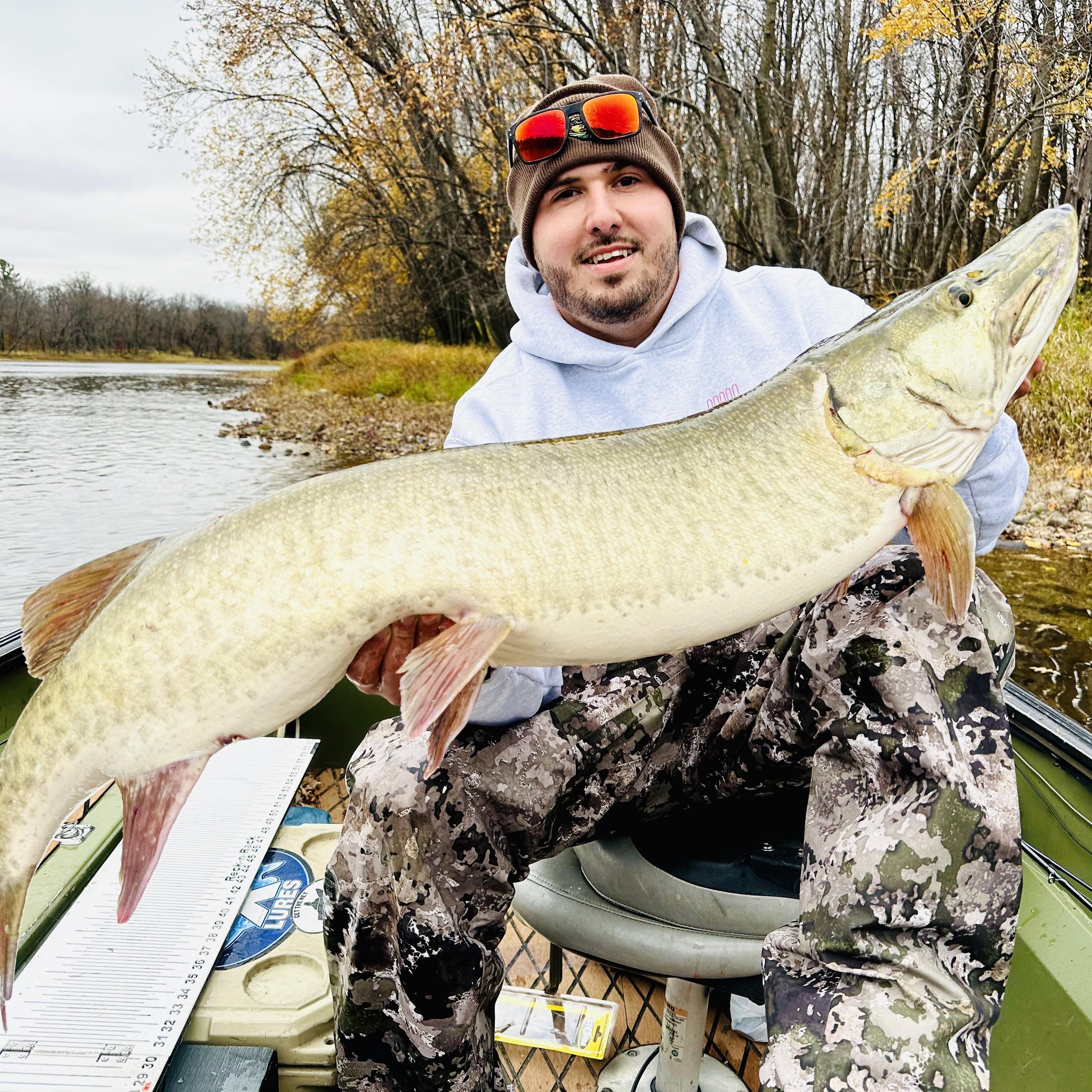 Sam Curro, owner of Third Coast Mechanical, holding a fish. Learn more about our team.